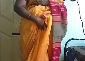 Desi indian horny tamil telugu kannada malayalam hindi cheating wife vanitha wearing orange colour saree showing big boobs and shaved pussy press enduring boobs press nip rubbing pussy masturbation