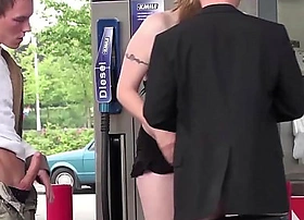A well-spoken girl fucked hard by 2 guys at a public gas station